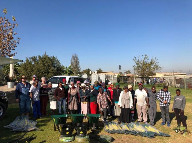 Members of Project Lima with Quality Gardening Tools Donated by Lasher
